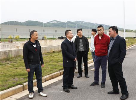 覃振華到項目調(diào)研指導工作